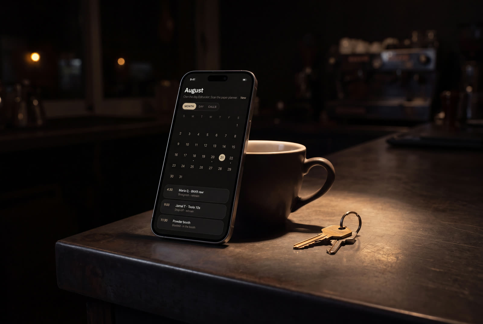 Phones showing a filled schedule beside shop keys